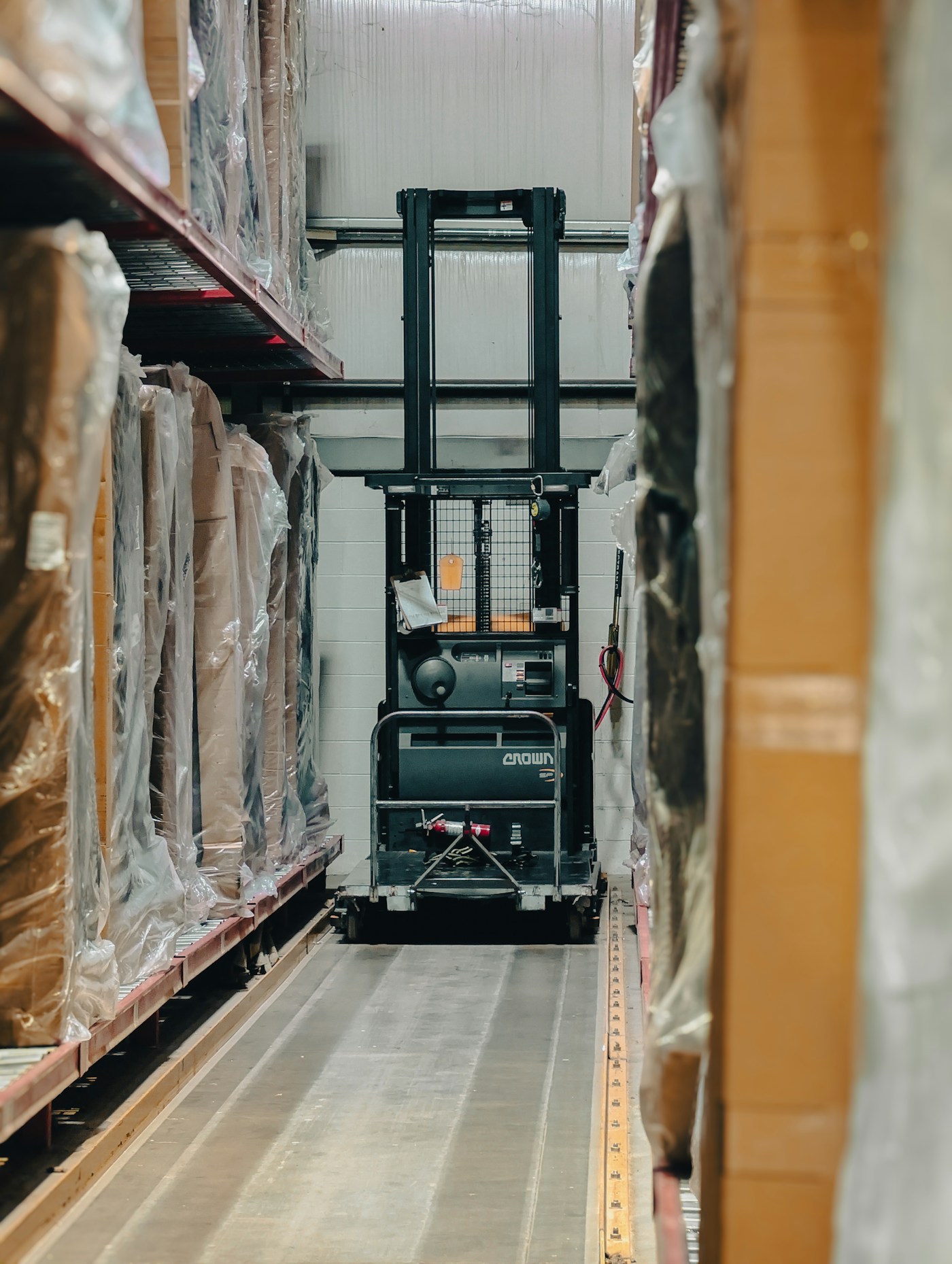 Organised warehouse with pallet storage and distribution aisles